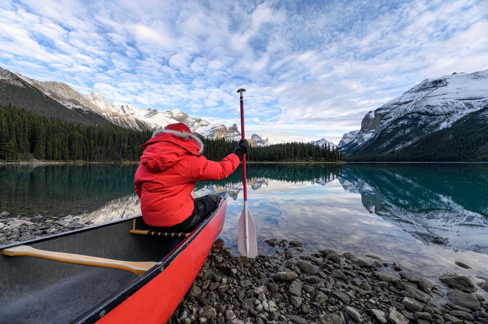 man-traveler-holding-paddle-on-red-canoe-in-spirit-2025-03-27-02-27-44-utcResized-1.jpg